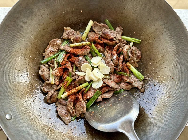 Add Garlic Slices