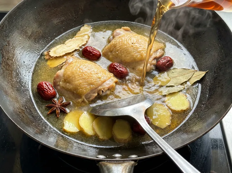 Strain Broth and Add Shaoxing Wine