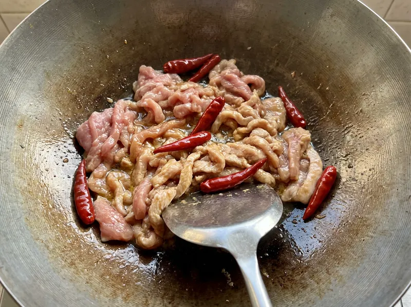 Add Marinated Pork Shreds and Stir-fry